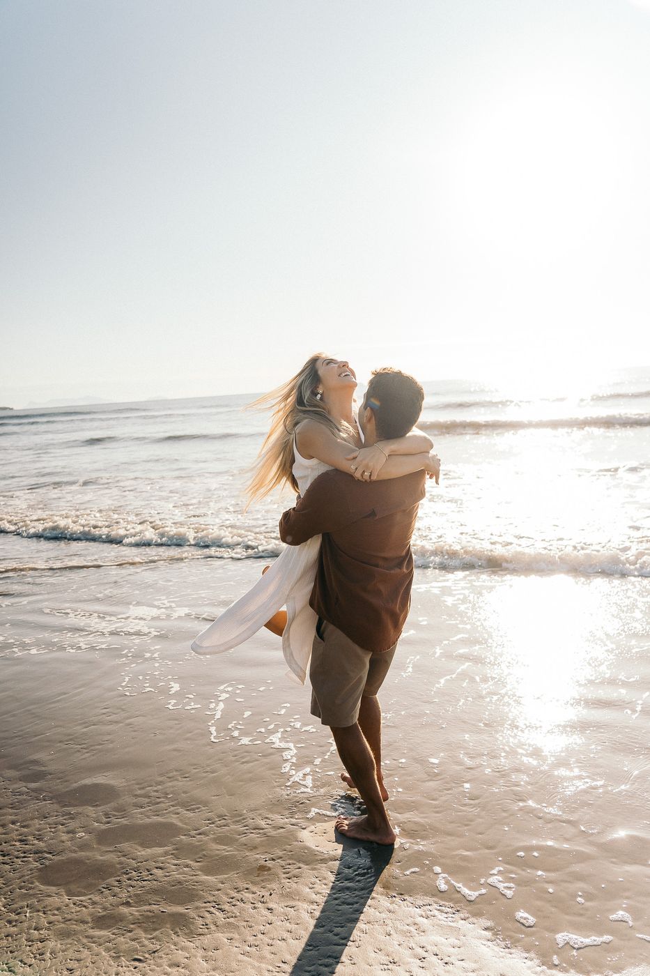Casal na praia, colo
