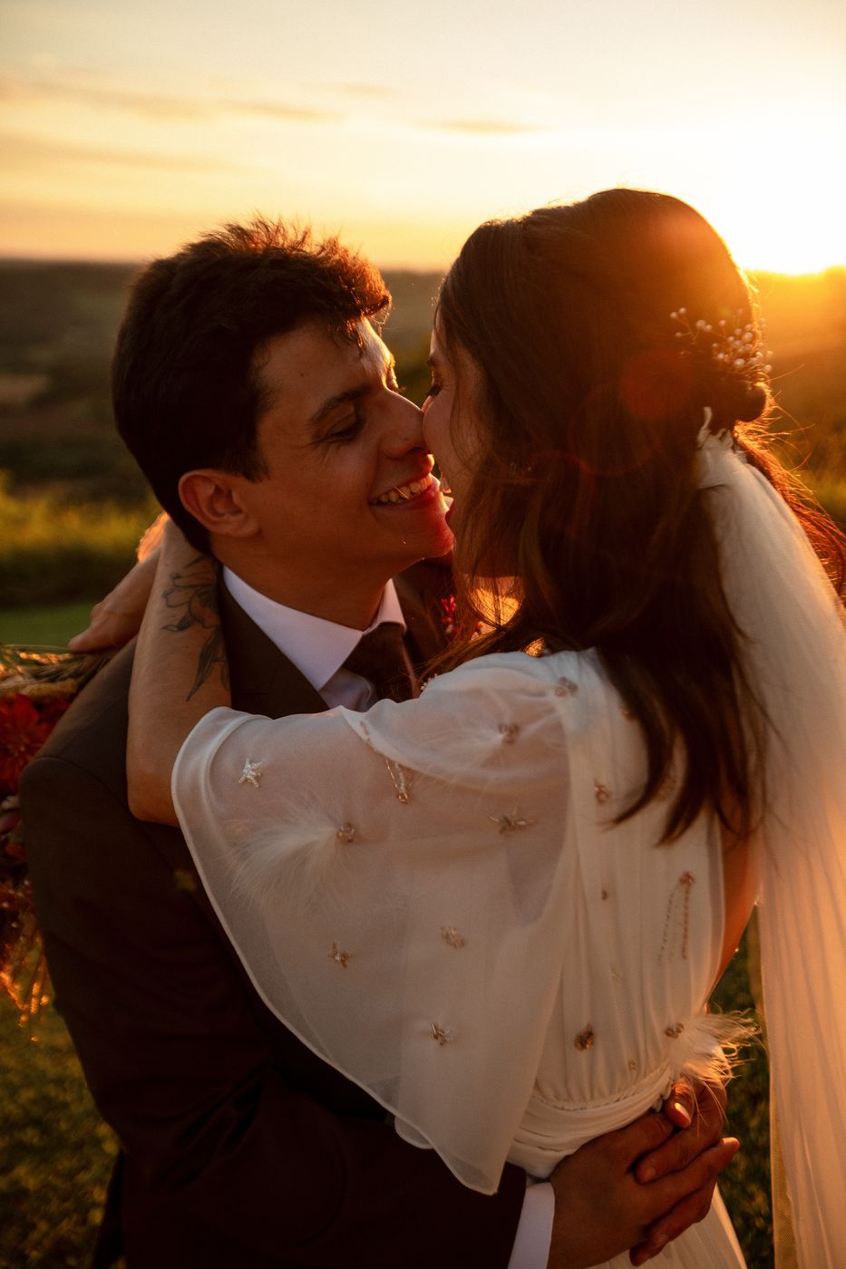 Casal ao pôr do sol, jardim